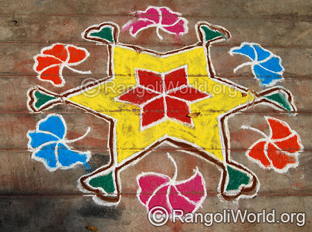 Star flower rangoli kolam with dotted pattern