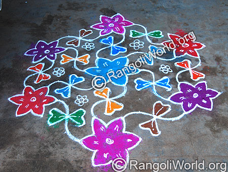 Flowers and zigzag combining lines kolam