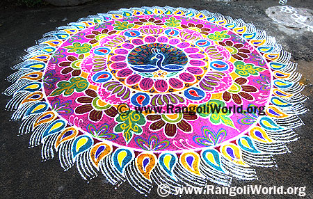 Freehand Rangoli with peacock and lotus flowers