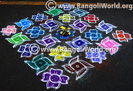 Double stroke swastik pooja flower rangoli for vinayaka festival 2015