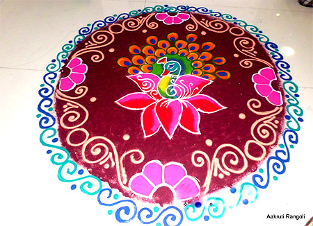 Peacock with lotus rangoli for holi festival 2015