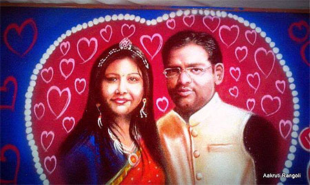Perfect couple freehand portrait rangoli 2015