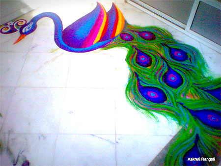 Single peacock rangoli for holi festival 2015