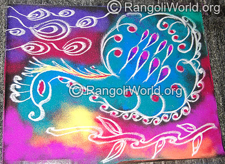 Freehand peacock rangoli – a quick design