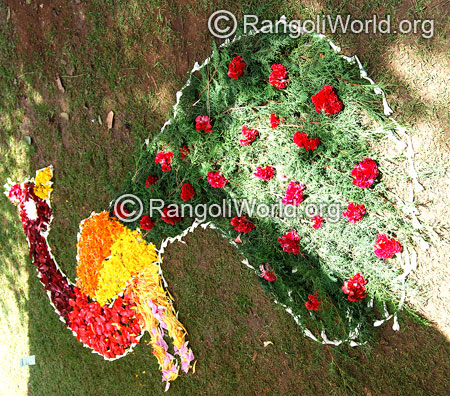 Onam festival flower peacock rangoli