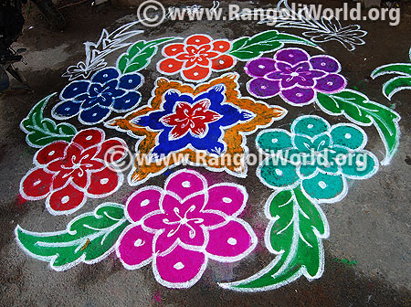Colorful flowers and leaf rangoli 2016