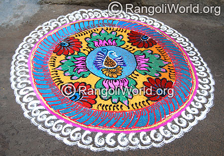 Peacock and lotus freehand Rangoli