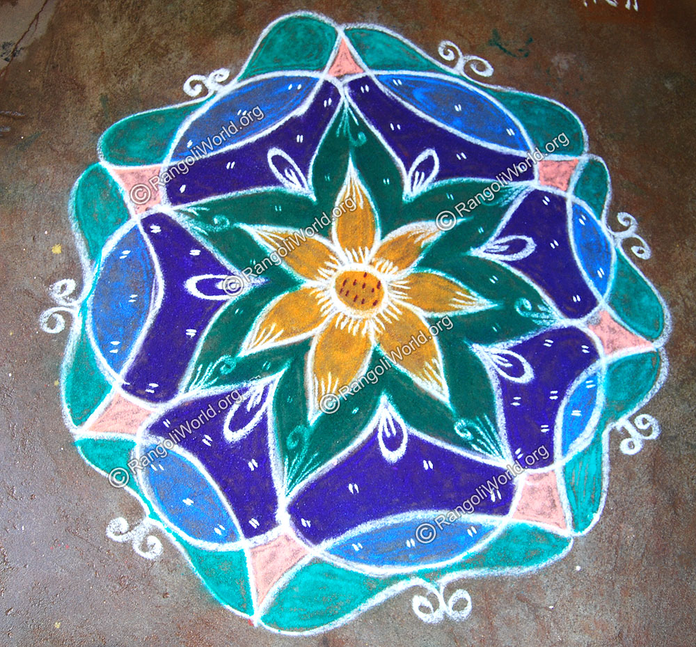 Flower Rangoli dec 23 2008 with orange, violet and strips theme